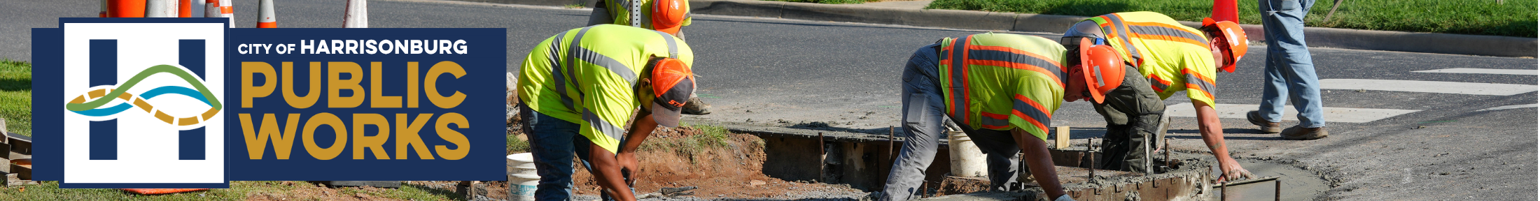 Harrisonburg Public Works in bold text as employees work on a sidewalk.