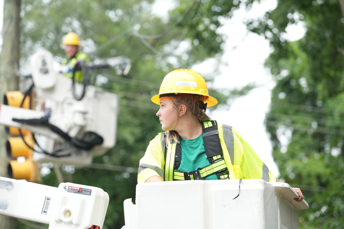 Employee in bucket truck