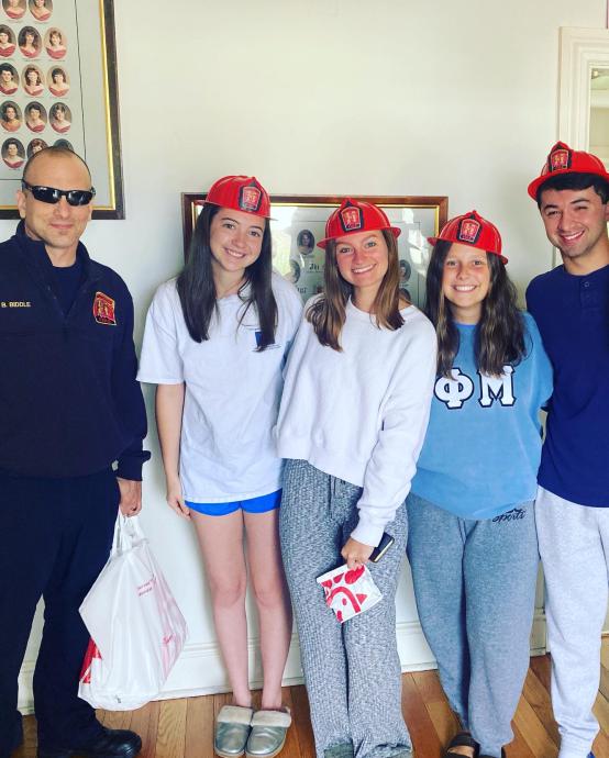 Campus fire safety - students in hats