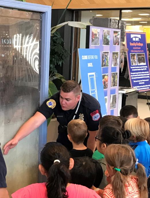 Firefighter teaches children