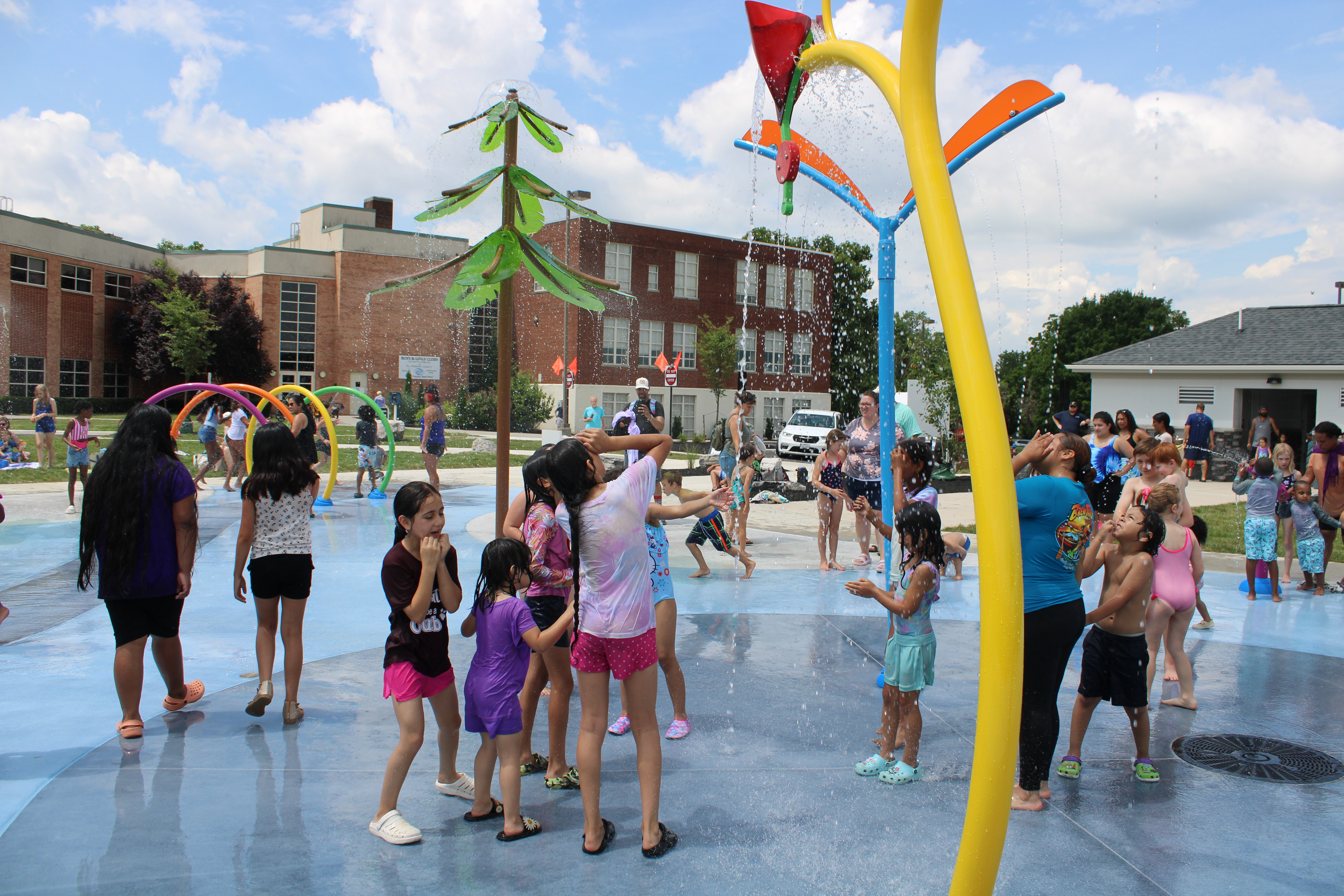 Image of many people playing at the Spraygrounds.
